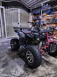 دراجة رباعية • ٢٠٠ سي سي • أوتوماتيك