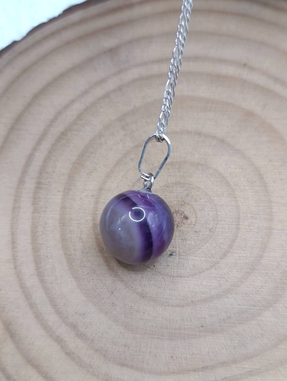 مجوهرات طبيعية ومميزة  وانوع متعددةفقط المدالية 
شنو نوع الحجر المستخدَم؟: 
عقيق بنفسجي وحجر النجوم ولازورد
هل السلسلة مصنوعة من الفضة النقية أو مطلية فقط؟: 
بدون سلسلة 
وين مكانك لليحب يستلم محلياً؟: 
بغداد البياع الشرطة الرابعة
هل أكو أكسسوارات إضافية مع القلادة؟: 
لا
شنو السعر المطلوب للقلادة؟: 
5 الف