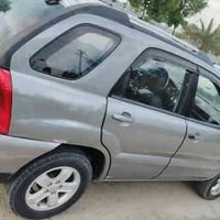 السلام علیکم كيه سبورتج 2009 سيارة  جاهزة من كلشي بس بيها جراد مكينه 6...