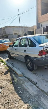 سياره فورت سكورت 1991محرك وكير شرط سياره وضع شركه وايرمنيه شغاله كيجات...