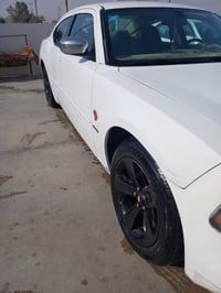 جارجر 2010 اصل كنديه جاهزه للاخير مصبوغه حزام بدون ضربه بدون دواخل  رق...