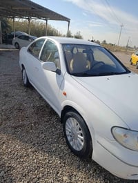 صني • ٢٠٠٥ • رقم نجف باسمي