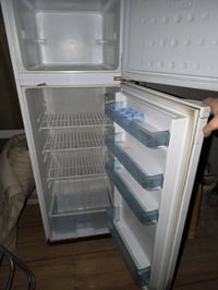 ثلاجة ودوشك جرابية نفرين للبيع 07709501088