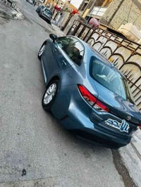 كورلا موديل 2023 وارد امريكي بانزين  مواصفات السيارة LE  محرك ٢٠٠٠ دوش...