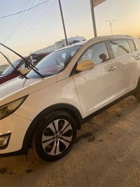 سبورتج • ٢٠١٣ • ٢١١الف