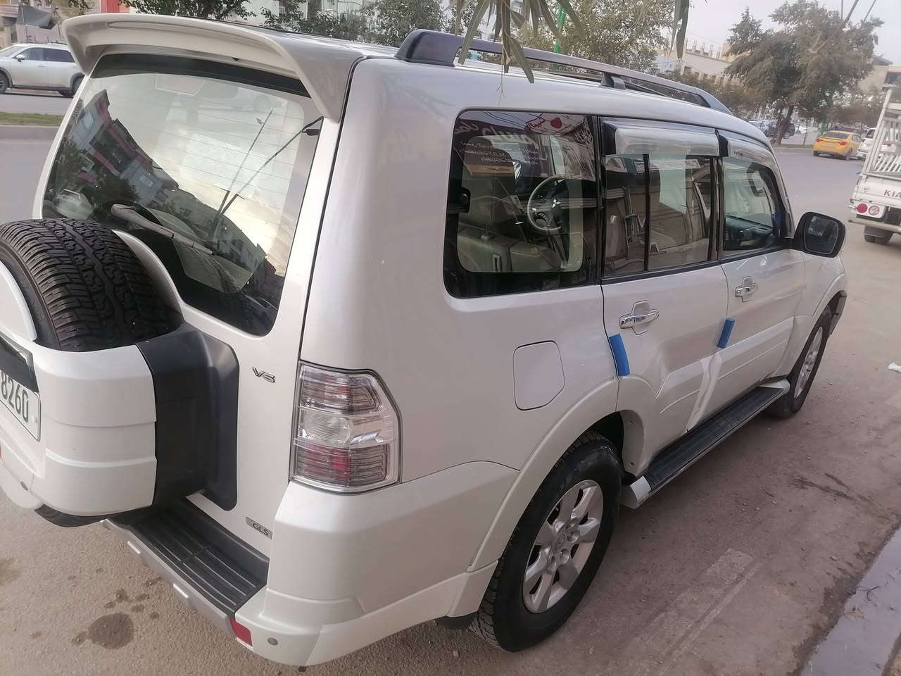 باجيرو ٢٠١٤ مكفول من صبغ وبارد رقم سليمانيه سعر ١٦٠ $    رقم موبايل ***********
