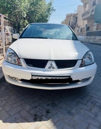 سيارة للبيع موديل 2011  مستيبوشي لانسر ستفسار على هاذة الرقم  07707020...