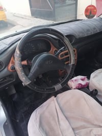 اكسنت ١٩٩٥ • كير عادي • رقم بغداد