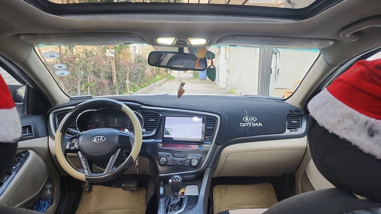 بداعي السفر كيا اوبتيما ٢٠١١ خليجي سياره بيها ثلاث قطع صبغ  كير ومحرك بيلادي ٢٤٠٠ دوش بشرط وللستفسار اكثر الرجاء الاتصال *********** والسياره موجوده باربيل
