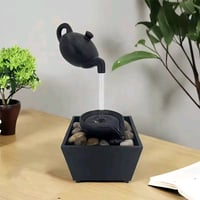 نافورة مياه على شكل ابريق شاي  السعر 15 الف