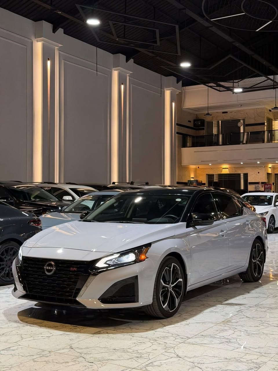 ‏Nissan Altima SR 2024
نيسان التيما 2024
عداد المسافة 4الف مايل
اللون : سمنتي (سموك) سقف اسود
ضرر :بابین صبغ بدون داخل
بجم و خلفي كبس ارباك ستیرن و دشبول سليم
المحرك : اربعة سلندر 2500

المواصفات SR
شحن واير ليس -
بصمة و بصمة ابواب-
تشغيل عن بعد-
رادار امامي تحديد مسار-
رادار خلفي-
رادار جانبي-
نقاط عمياء -
لايت زينون بلادي-
حساسات خلفي اوتو ستوب -
كشنات جلد + كهربائي + هيتر -
ستيرن تدفئه-
‏Apple car play +Usb+Aux
كامرة خلفية-
اشارة بالمري-
ويل كب -
دوسة ليد

‏‎‏‎ مکان سیارة اربیل 
‏‎‏‎سیارة بدون رقم تترقم شمالي 
‏‎‏‎‏‎للاتصال والاستفسار
‏‎اسیاسیل ***********☎️
☎️کورك ***********
