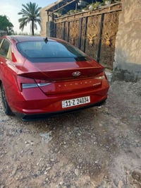 عله بركه الله عندي سياره النترا هايبرد موديل 2023 رقم بغداد دولي محرك ...