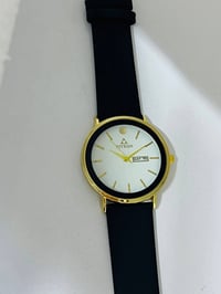 ساعة رجالية • بألوان • قرب مجمع سيد عبدو