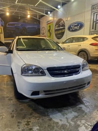 اوبترا 2013 رقم بغداد انكليزي  مكينة كير كهربائيات كفالة  تبريد جديد ث...