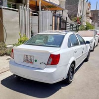 اوبترا 2012شركة عامة سيارة جديدة  عنواني بغداد الشعب موبايل 0771817255...