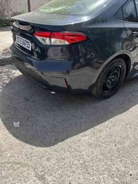 كورلا مواصفات LE معروفه  موديل 2024 لون سمنتي غامض سيارة ماشية 39 الف ...