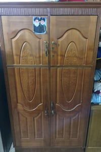 كنتور خشبي • خشب متين • أبواب منقوشة