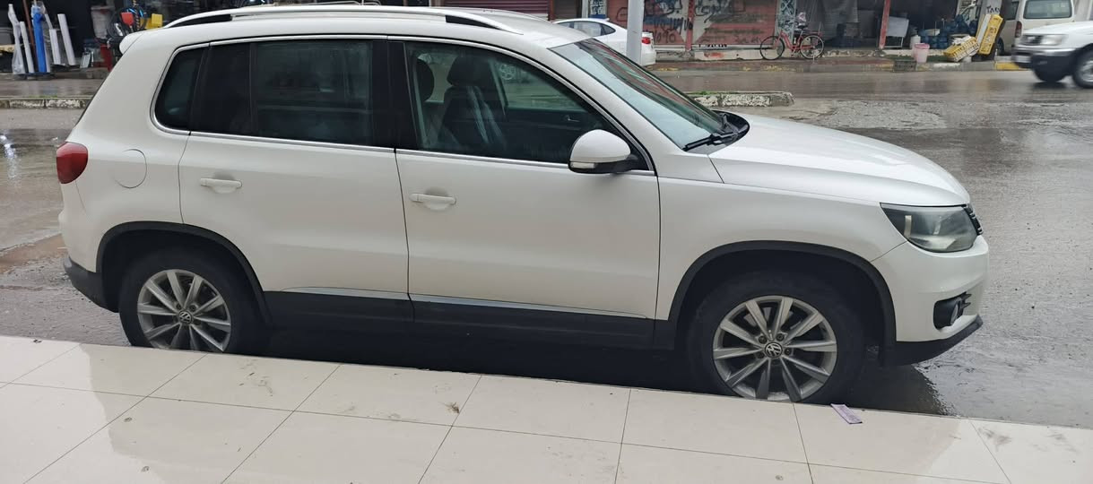 بەناوی خودا
تیگوان مۆدێل 2012
خلیجی
نیو دەرگای بۆیاغە
***********
