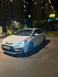 للبيع كورلا هايبرد S  2024  رقم بغداد الدولي  باسمي تحويل مباشر  ماشيه...
