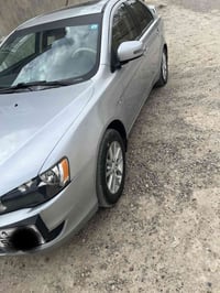 لانسر موديل 2016خليجي  رقم بغداد سنويه جديده  ضرر بس جاملغ مصبوغ اثر ش...