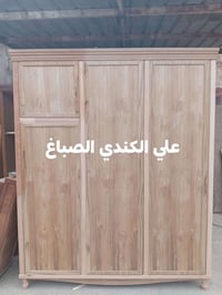 دولاب ٣ أبواب • رفوف وتعلاكه • صبغ حراري