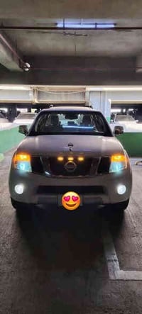 نيسان باثفايندر خليجي لون ابيض موديل ٢٠١١ رقم بغداد مشروع وطني باسمي م...