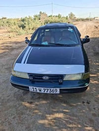 كيه سيفيا موديل 94 لون زيتوني بأسمي رقم بغداد لوحات دولي كير ومكينه كف...