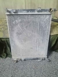 راديتر نيسان فيرسا ٢٠١٣ أمريكي واعتقد يرهم عالسني التيدا ما اعرف للبيع...