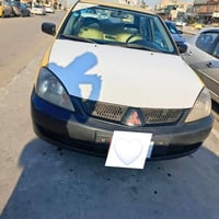 لانسر 2009للبيع   رقم بغداد بأسمي سنوية28   سيارة قبل شهرين مبدل صدرها...