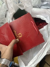 ١٢ علبة • اوميغا • رولكس