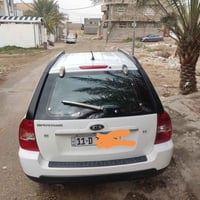 سبورتج 2010 رقم بغداد صبغ قطعتين الباقي وضع شركة عليها سيرفس كامل السي...