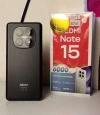 الجديد من شركة ريدمي اللون الاسود استعمال يوم فقط  (( نوت 15 )) جهاز ج...