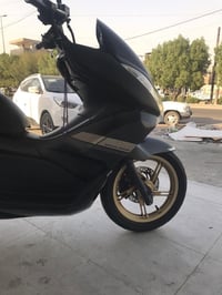 *المواصفات:* - *اللون*: نفطي على أسود + خط ذهبي ياباني بلادي - *المحرك...