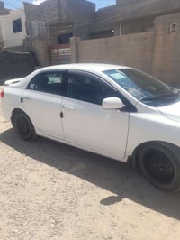كورلا موديل ١٢ وأرد مريكي سيارة بيهه صبغ حزام  رقم بغداد مشروع وطني  ر...
