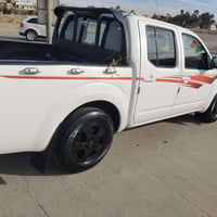 نيسان نافارا • ٢٠٠٩ • غاز إيطالي