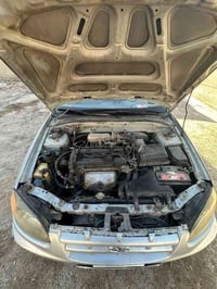 اكسنت فيرنا موديل 2005وارد امريكي تك باب مكينة وكير بحالة جيدة  تبريده...