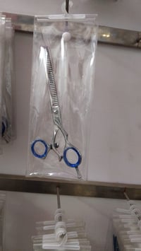 مستلزمات حلاقة • مقصات وموس • توزيع عالمي