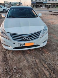 ازيرا • ٢٠١٤ • ابيض صدفي