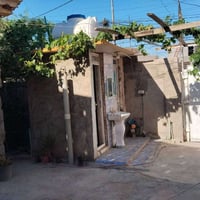 قطعة ارض 260م  تحت البناء 144م تبعد عن طريق الزوار مسافة 500م في   منط...