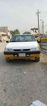 بيجو 405موديل 2010 تحويل مباشر  مكينه كير صدر تبريد تدفئه كله جديد عله...