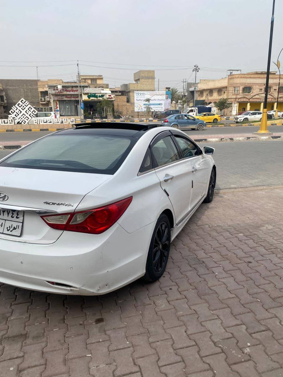 سلام عليكم سوناتا خليجي موديل ١٠ ضررها باب وجاملغ جهت السايق فول عدا البصمه بانوراما بسم كردي مو شركه ما مطلوبه  غرامات  مكان السياره نجف وهذا رقمي *********** السعر 100
