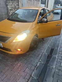 نيسان فيرسا وارد امريكي موديل ٢٠١٢  رقم وسنويه وهيئه وغرامات كله مصفره...