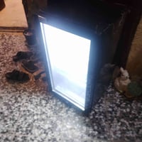 ثلاجة صغيرة شغالة كامله بس بيها صوت للبيع نهايتها ٧٥ مكان بغداد حي الك...