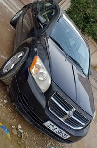 ٢٠٠٩ سلايد SXT.. بدةن دعم  ماشية ١٠٠ الف حقيقي  صبغ بعض القطع لكن ابيع...