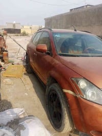 سياره نسيان مورانو موديل 2006 مكينه وكير جديد وصدر جديد رقم بغداد وبسم...