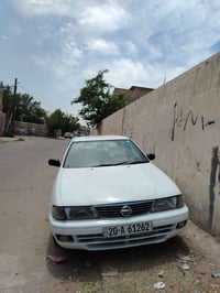 سيارة نيسان سني موديل 1995 كير اوتو  رقم انكليزي بسمي السعر 40 وبيهة م...