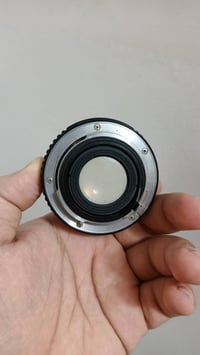 عدسه 50 ملم كانون للبيع استفسار 07861855315