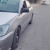 لانسر موديل 2008  رقم اربيل شرط التحويل سنويه نافذه   سياره بيه صبغ قط...
