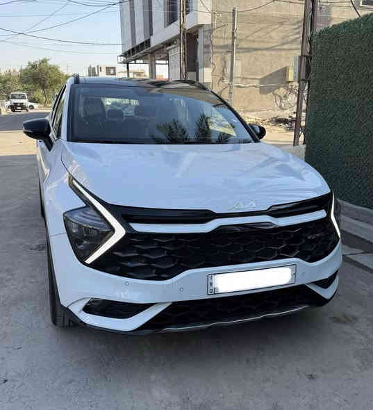 💥 كيا سبورتج 2025 gtline لوحات بغداد للبيع
🔹 الموديل: 2025 (خليجي)
🔹 المحرك: 2.0 – 4 سلندر
🔹 العداد: زيرو (3،600 كم)
🔹 نظام الدفع: فور ويل (دفع رباعي)
🔹 السعر: 27،500$

⸻

❗️أهم المواصفات:
. بانوراما
 • دخول ذكي (بصمة) + تشغيل عن بعد
 • مقاعد كهرباء عدد 2
 • مقاعد تدفئة
 • صندوق كهربائي
 • مصابيح أمامية وخلفية LED
 • شبك أمامي بيانو بلاك
 • حساس أمامي + خلفي
 • ويل كب قياس 19
 • شاشة كبيرة أصلية مع كاميرا
 • سايد بريك بصمة + أوتو هولد
 • تبريد + شاشة مناخ منفصل
 • مرايا متحسسة للضوء العالي
 • تبريد قطعتين
 • محدد سرعة + فول تحكم ستيرن
 • شاشة عدادات ديجيتال

⸻

📞 للاستفسار: ***********
