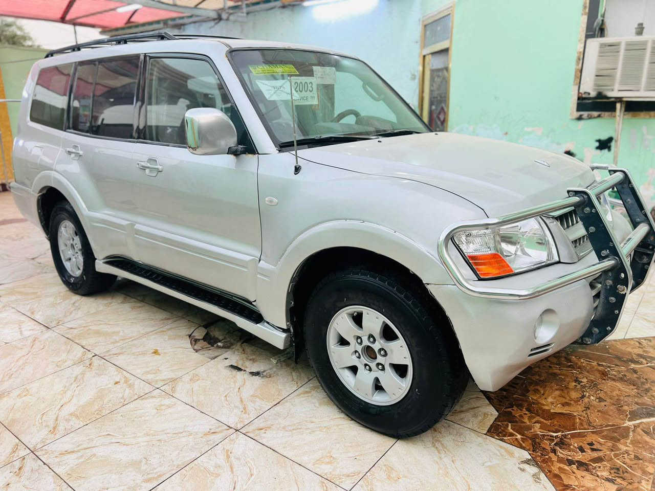 السلام عليكم للبيع باجيرو موديل 2003 رقم بصره مشروع وطني تحويل ثاني يوم سياره مكفوله من الكصه والنقل الجثه والضربه والكلبه والعيب الشرعي مكينه وكير اوتماتيك بلاد جدد حداده طخم تاير ويلكب جدد تبريد شغال سياره جاهزه وجديده السعر 79 ورقه الاستفسار الرقم ‏  ***********‏ مكان السياره البصره الزبير, البصرة
